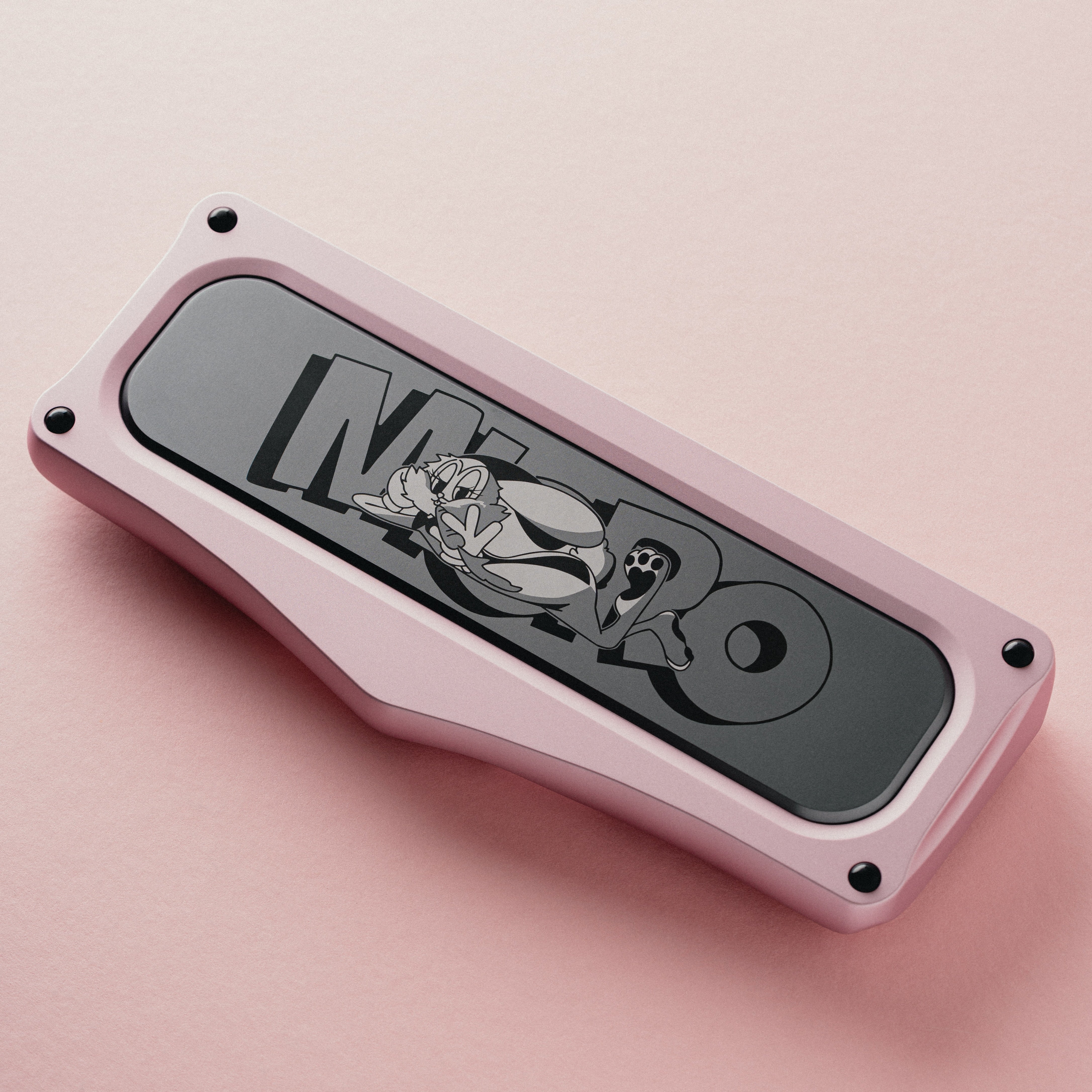 Pink keyboard case with a dark illustrated metal insert